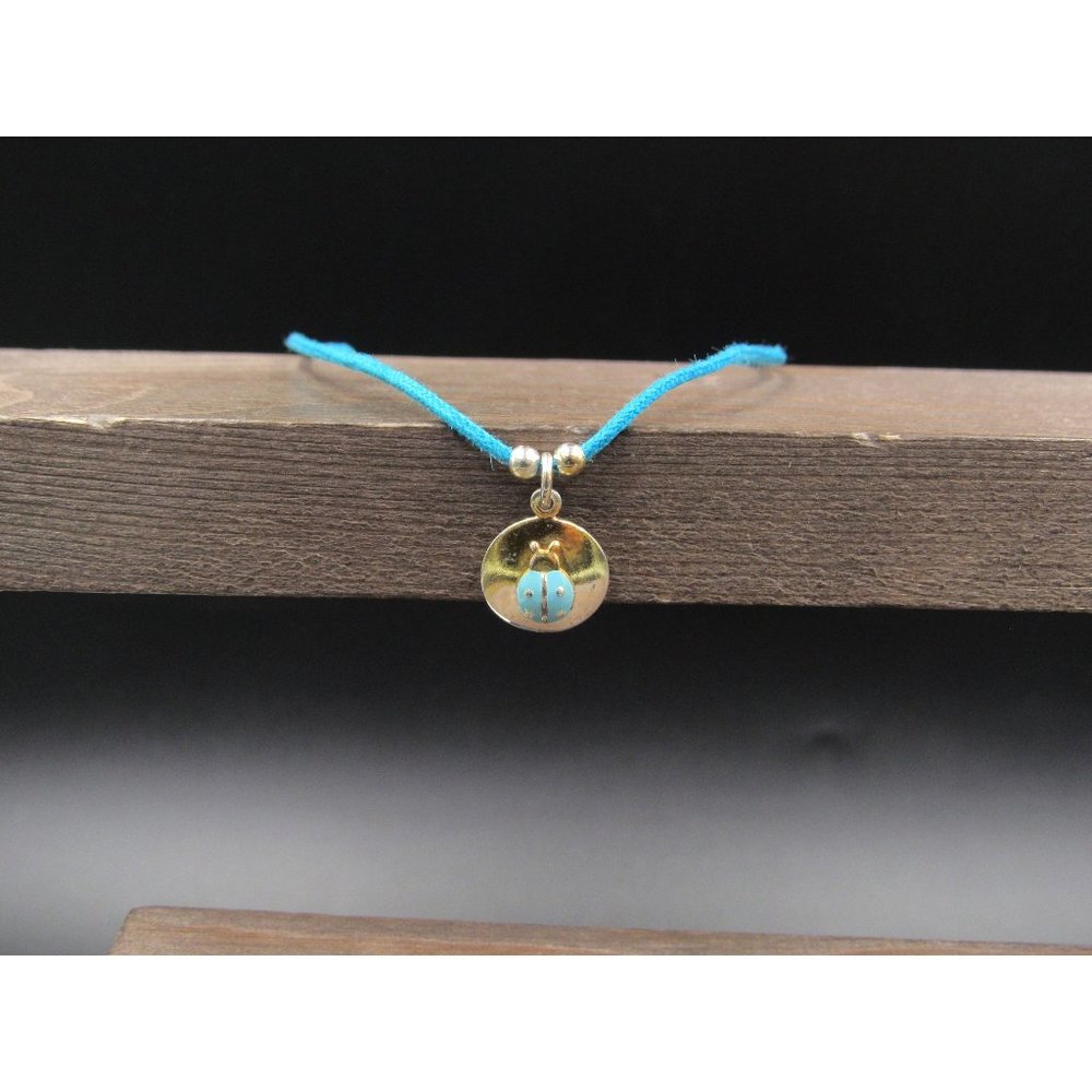 8 Inch Sterling Silver Blue Cord Two Tone Ladybug Bracelet